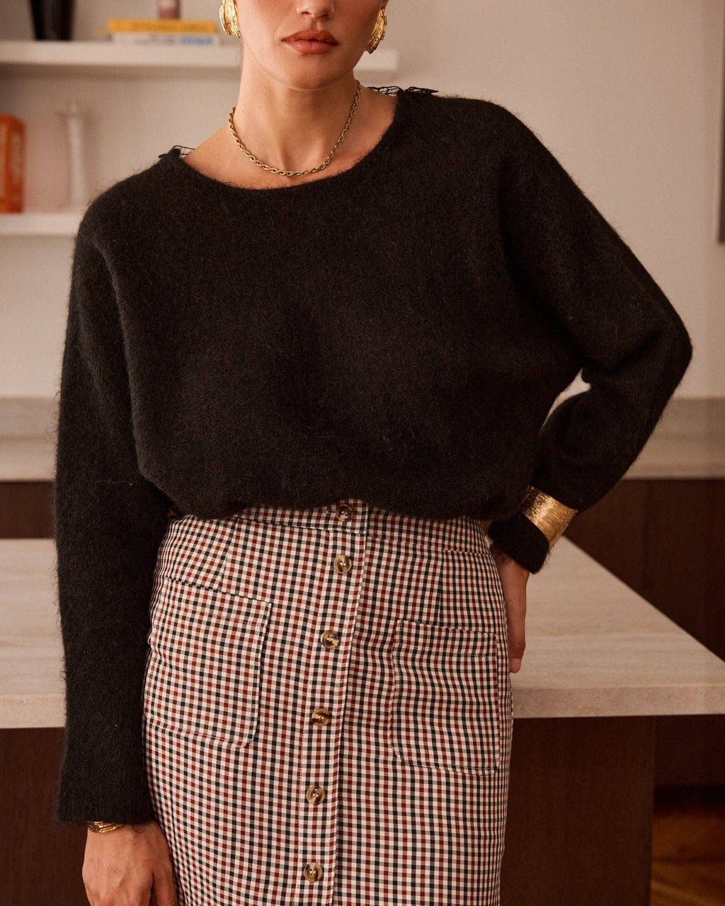 Pull noir décolleté dos