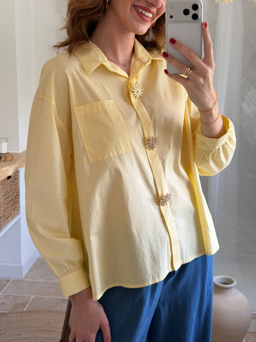 Chemise en coton détail plissé dans le dos.